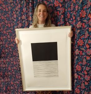 Isabelle and her prize Gormley print
