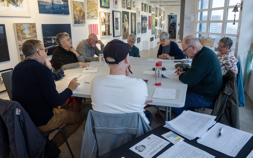 Participants at a poetry writing workshop